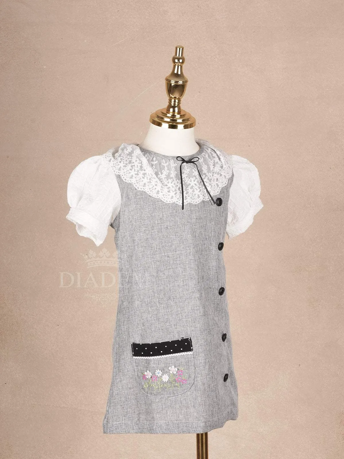 Grey Cotton Frock Adorned with Black Buttons and Peter Pan Collar for Girls